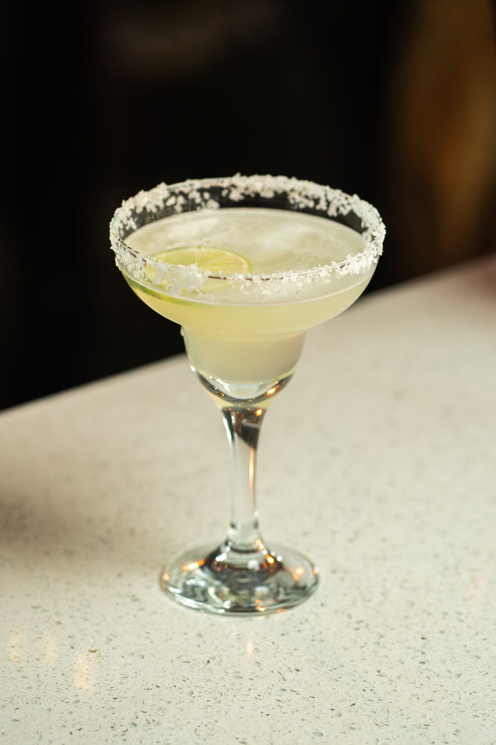 A cocktail garnished and ready to serve