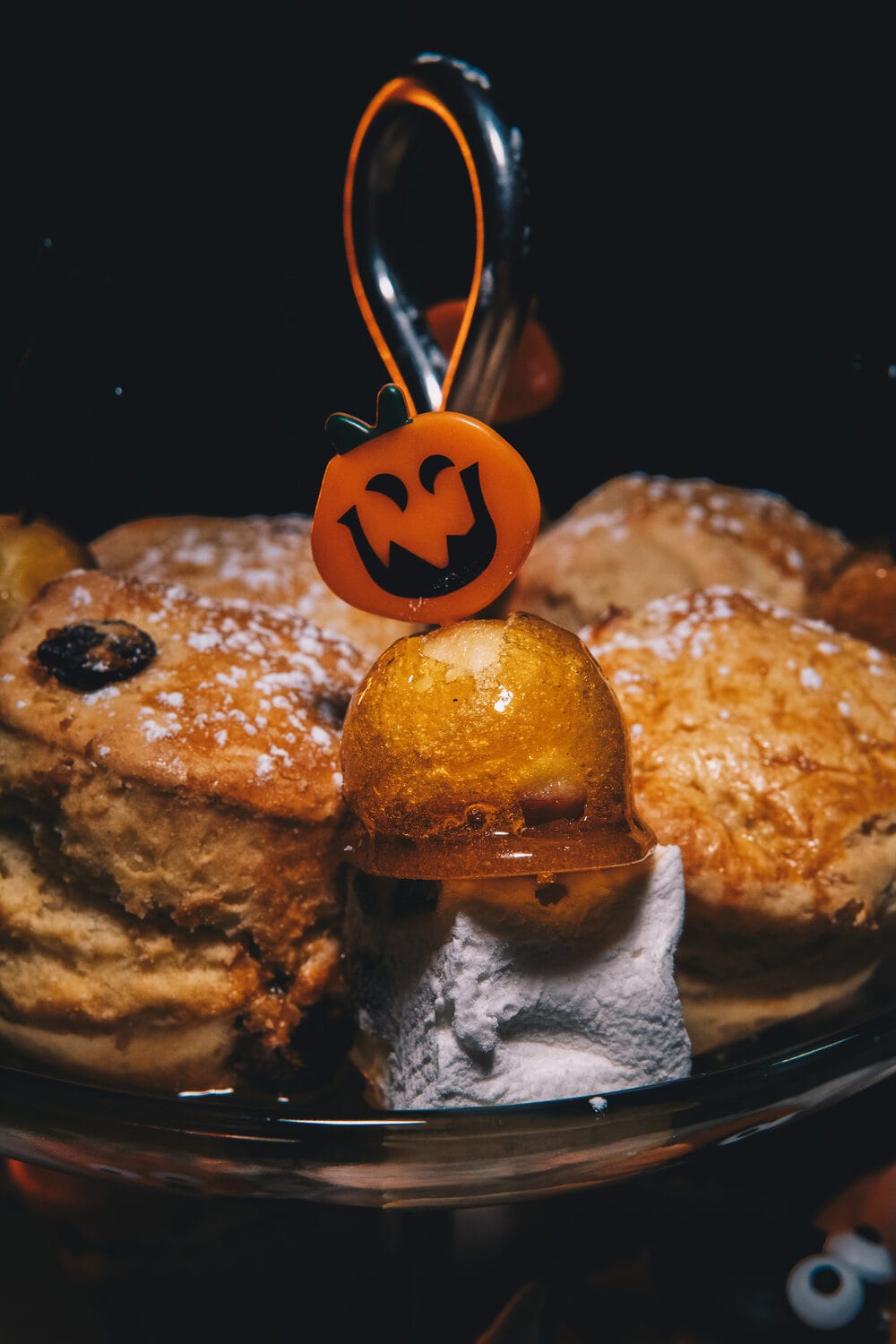 A pumpkin toffee apple at a Halloween event