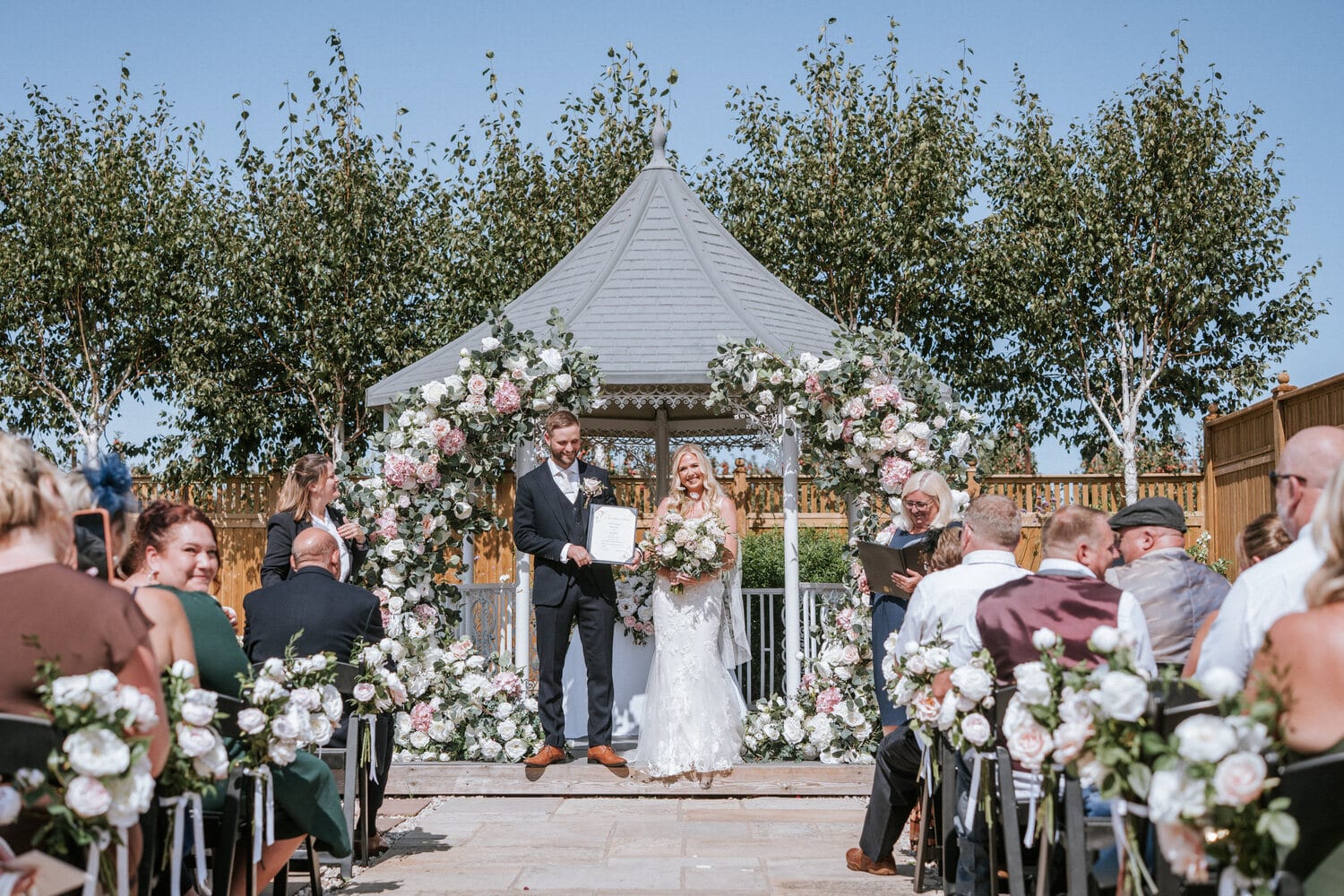 Guests lining the stone aisle of the lavender walk