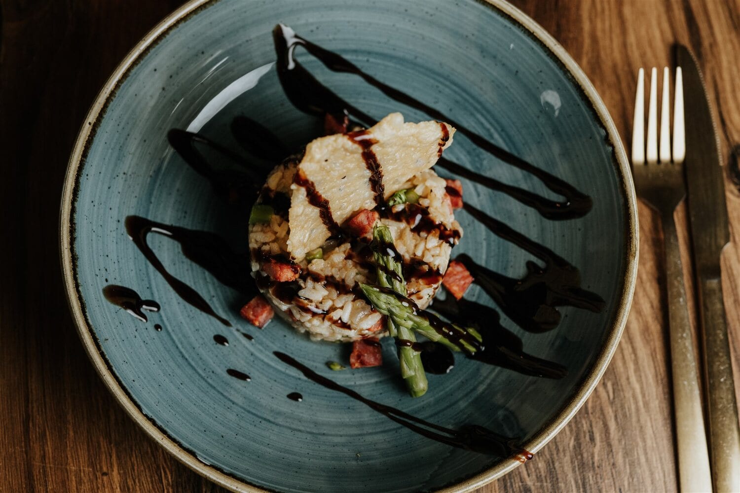 A grilled main with greens and balsamic