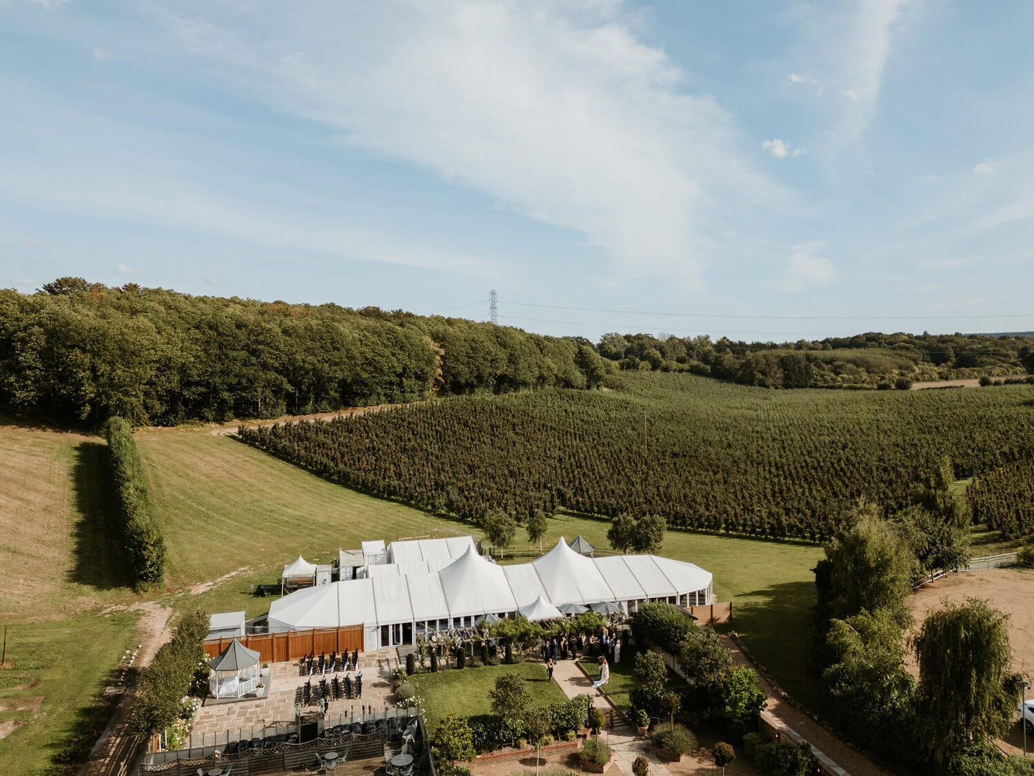 An aerial view of The BarnYard set in its orchards