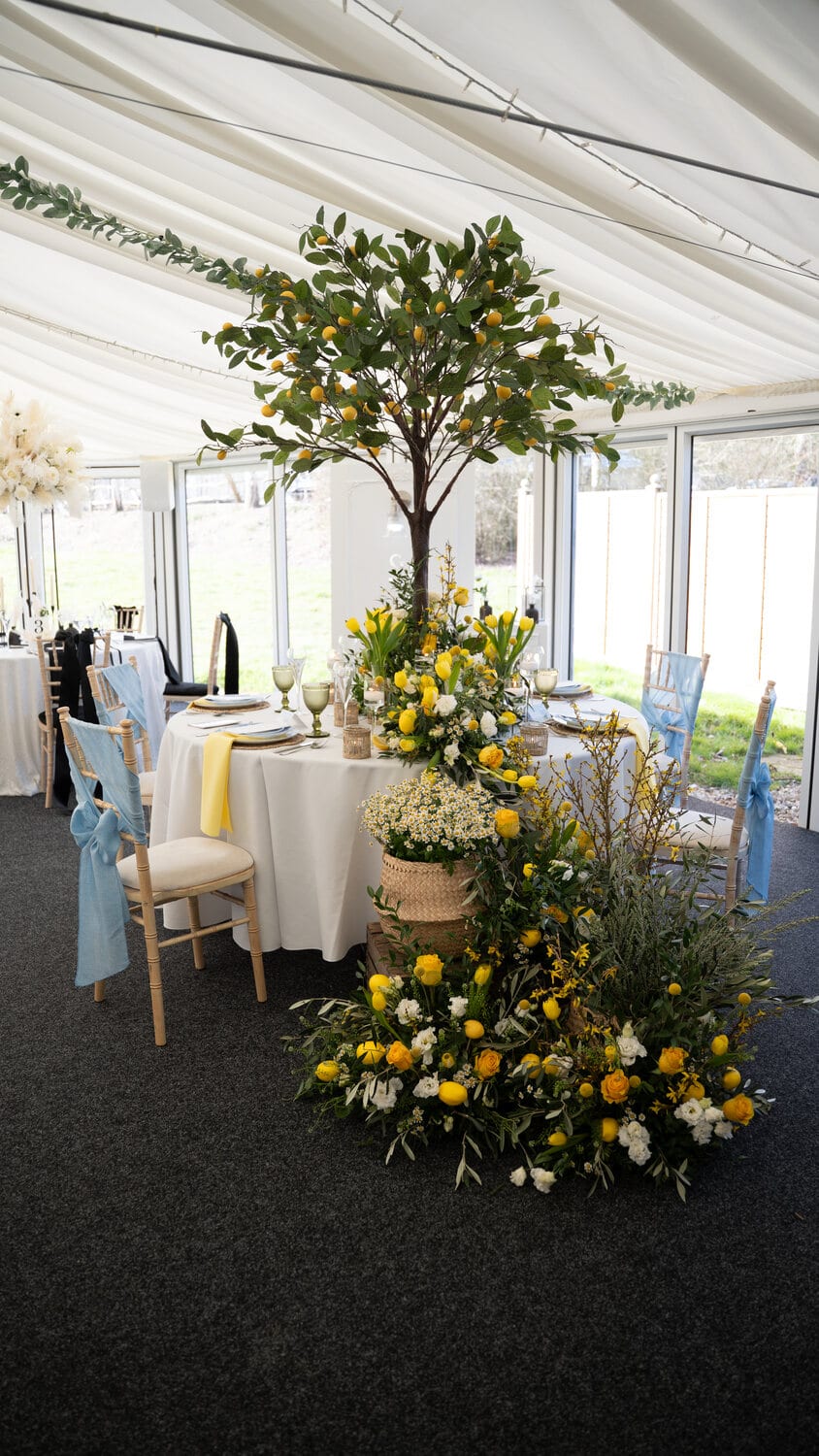 Tables dressed for a wedding breakfast in the marquee
